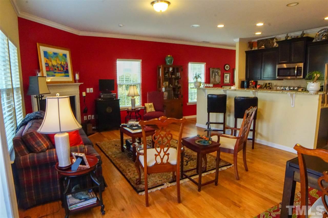 1023 Ileagnes Road Raleigh, NC 27603 - Photo 11 of 25 a view of a dining room with furniture window and outside view