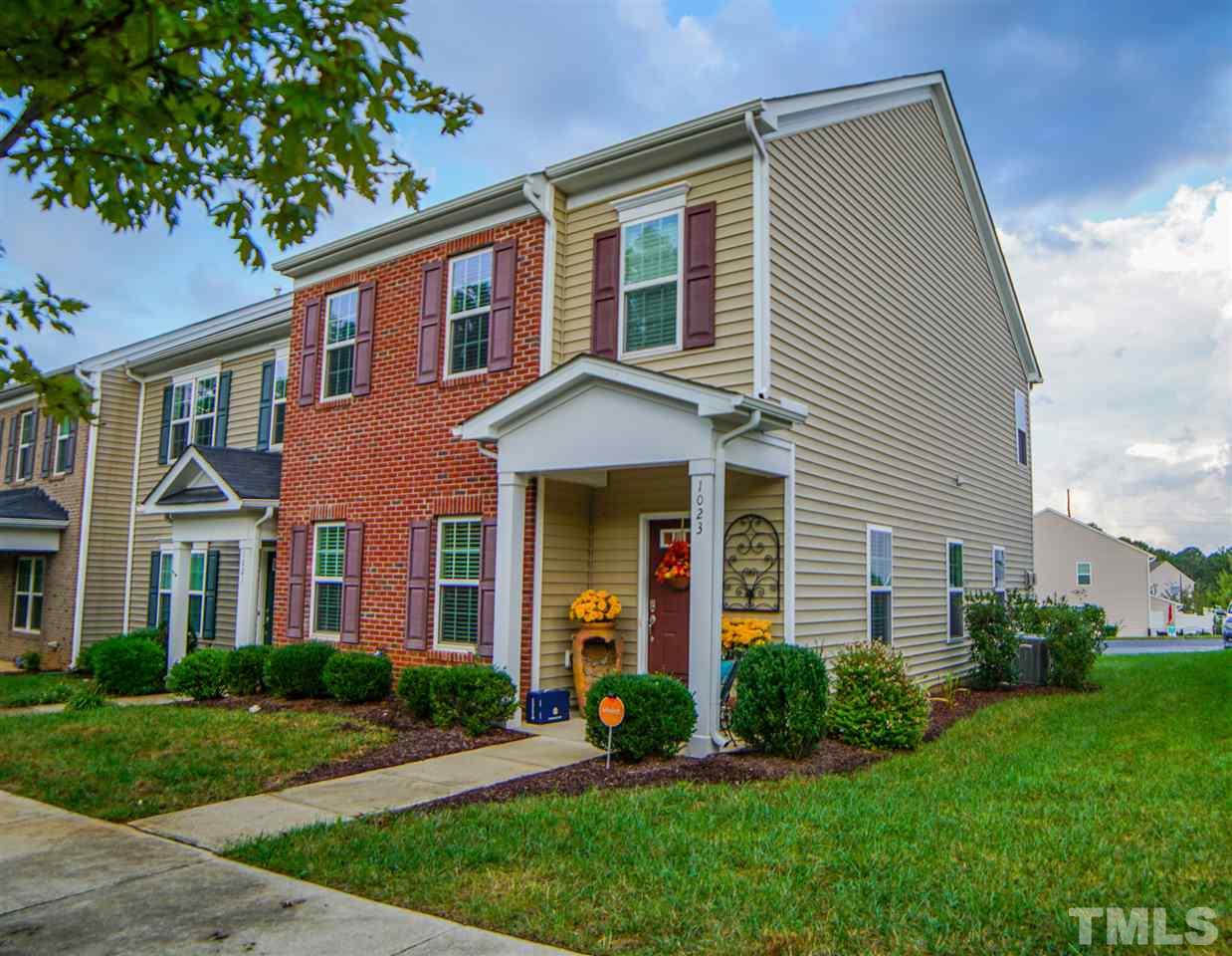 1023 Ileagnes Road Raleigh, NC 27603 - Photo 13 of 25 a front view of a house with garden