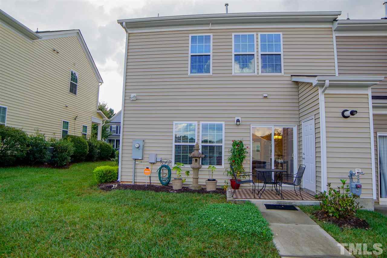 1023 Ileagnes Road Raleigh, NC 27603 - Photo 24 of 25 a view of a house with backyard and porch