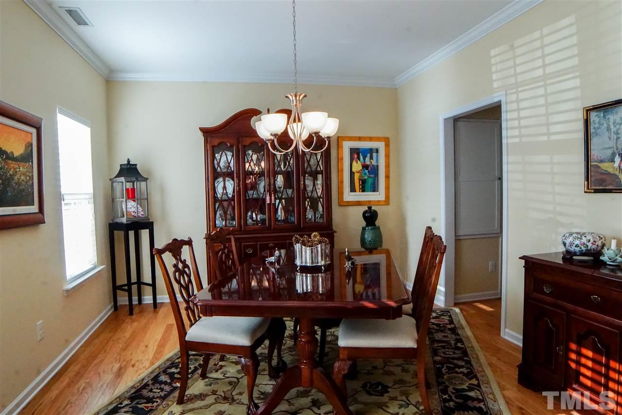 1023 Ileagnes Road Raleigh, NC 27603 - Photo 8 of 25 a dining room with furniture and window
