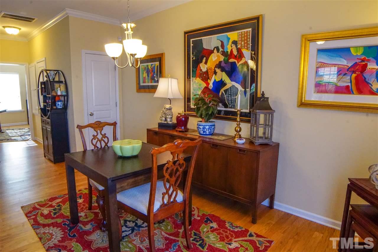 1023 Ileagnes Road Raleigh, NC 27603 - Photo 9 of 25 a view of a workspace with furniture