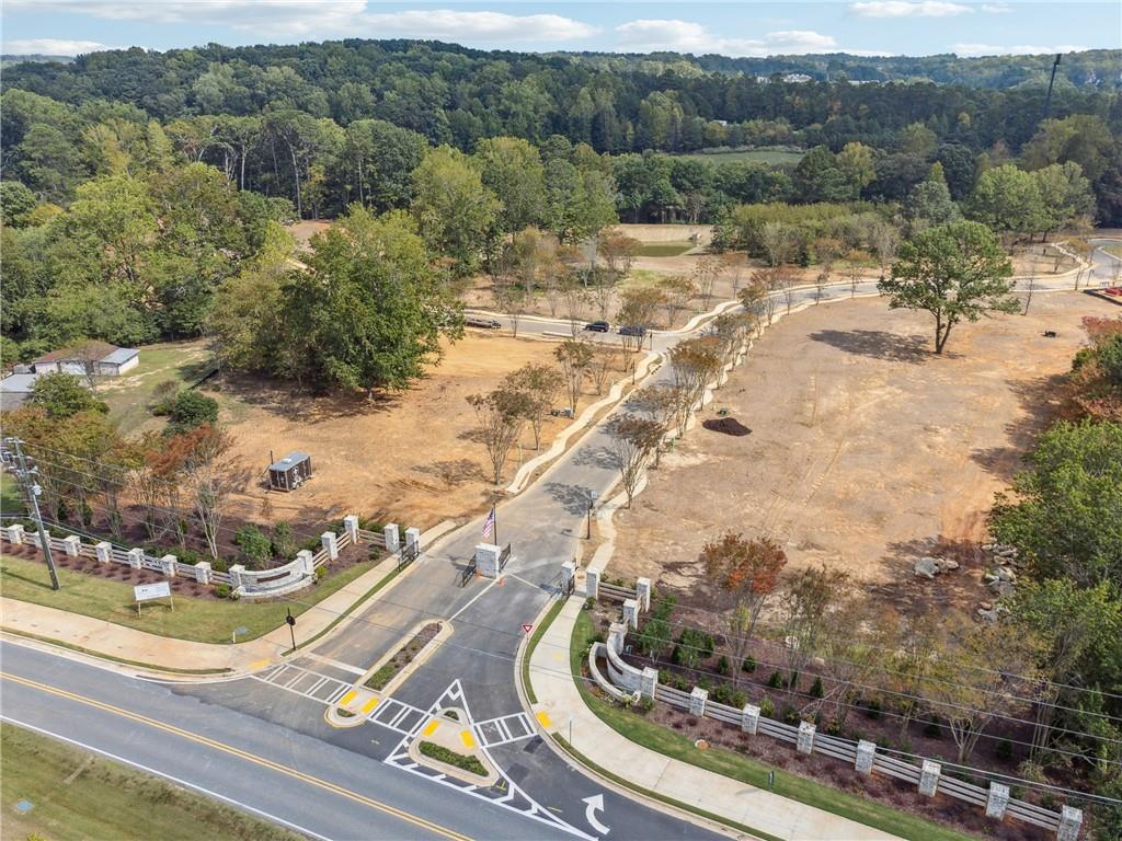 4510 Muskogee Court Cumming, GA 30040 - Photo 2 of 22 a view of a lake view