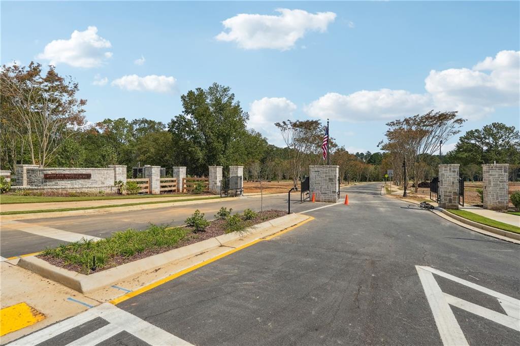 4510 Muskogee Court Cumming, GA 30040 - Photo 3 of 22 a view of a swimming pool with a yard