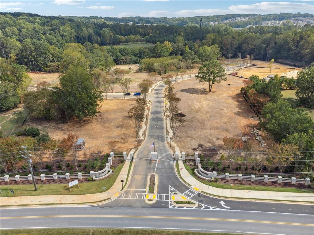 4510 Muskogee Court Cumming, GA 30040 - Photo 4 of 22 an aerial view of residential houses with outdoor space