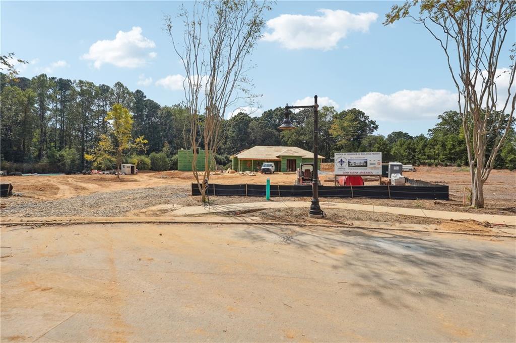 4510 Muskogee Court Cumming, GA 30040 - Photo 9 of 22 a view of a city street with cars