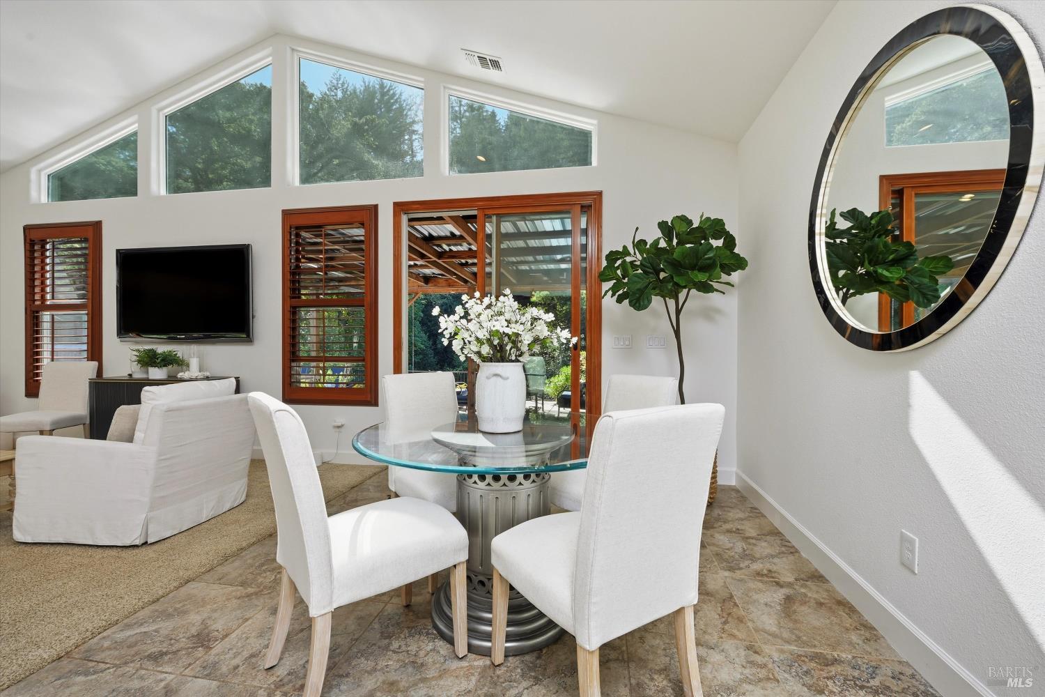 5251 Dry Creek Road Napa, CA 94558 - Photo 11 of 61 a view of a livingroom with furniture and a potted plant