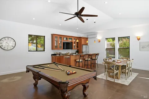 a living room with furniture and a table