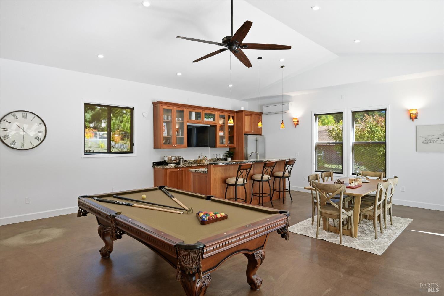 5251 Dry Creek Road Napa, CA 94558 - Photo 48 of 61 a living room with furniture a window and a flat screen tv