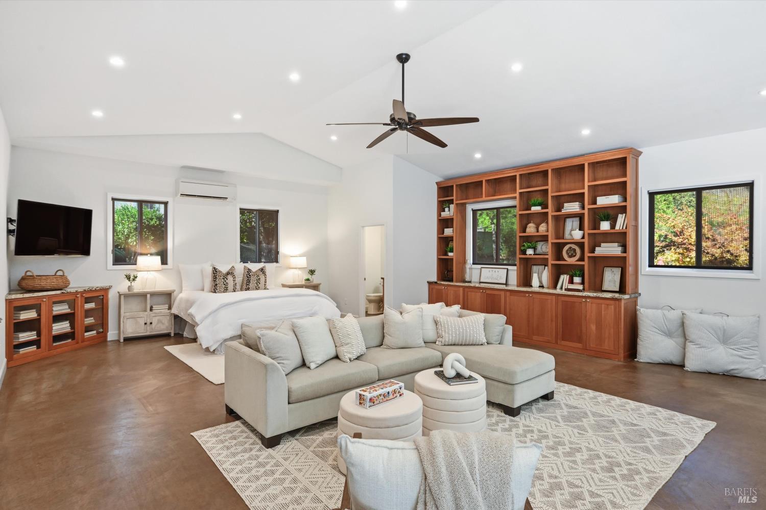 5251 Dry Creek Road Napa, CA 94558 - Photo 50 of 61 a living room with furniture and wooden floor