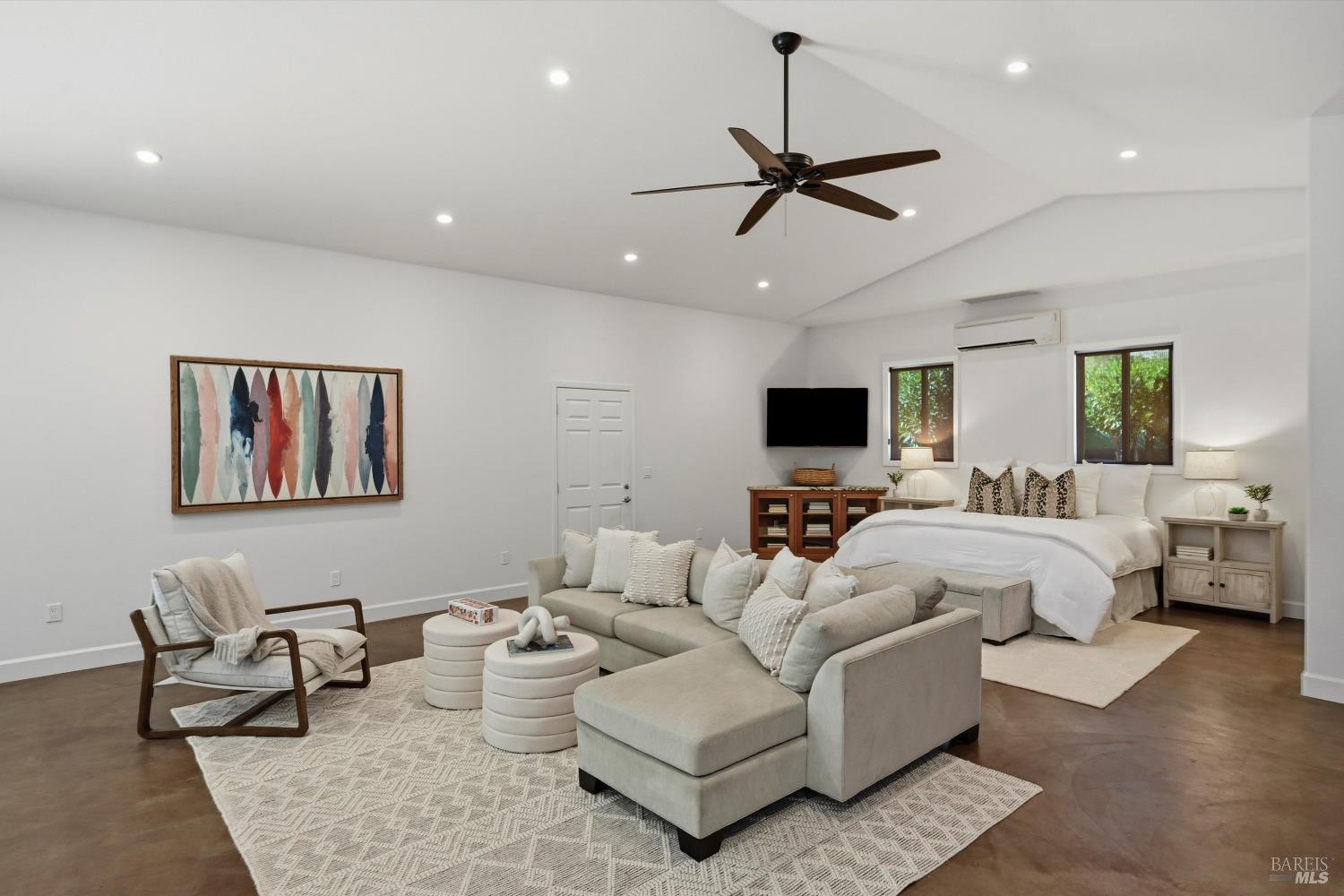 5251 Dry Creek Road Napa, CA 94558 - Photo 53 of 61 a living room with furniture and a flat screen tv