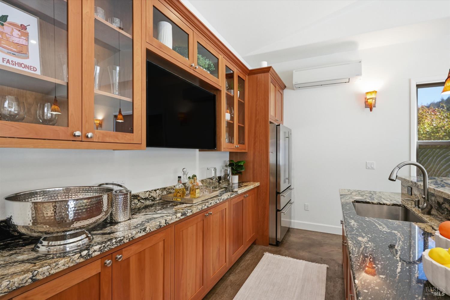 5251 Dry Creek Road Napa, CA 94558 - Photo 55 of 61 a kitchen with stainless steel appliances granite countertop a sink stove and cabinets