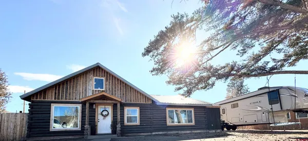 a bedroom with a bed and a walk in closet