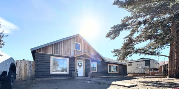 a bedroom with a bed and a shower