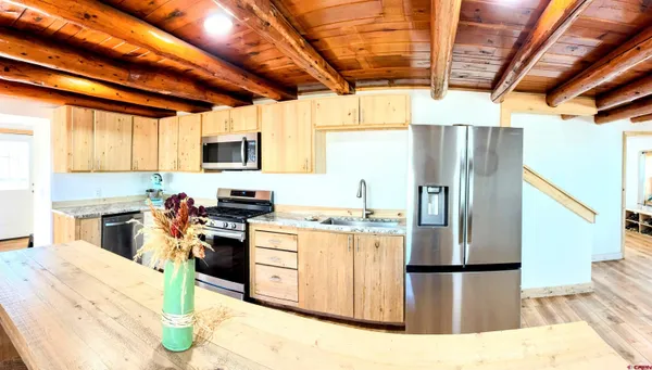 a backyard of a house with yard and garage