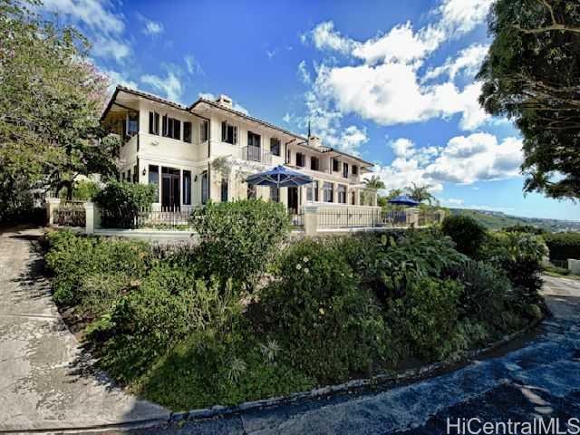 1908 Judd Hillside Road Honolulu, HI 96822 - Photo 1 of 1 a front view of a house with plants and trees