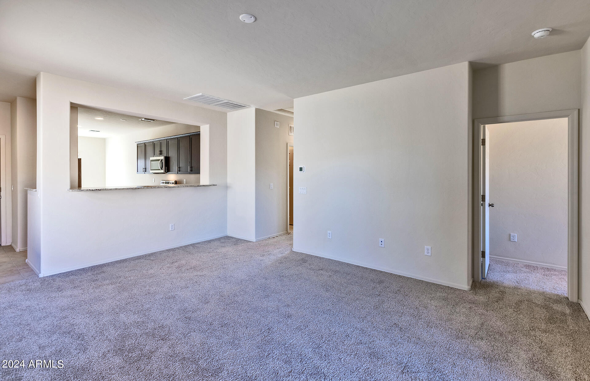 24420 West Ripple Road Buckeye, AZ 85326 - Photo 11 of 23 9 - Gathering Room