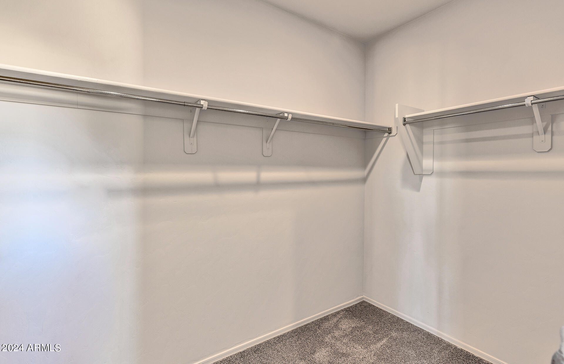24420 West Ripple Road Buckeye, AZ 85326 - Photo 17 of 23 15 - Owner Closet