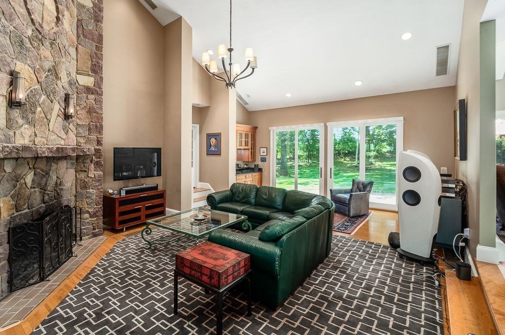 30 Autumn Lane Hamilton, MA 01982 - Photo 14 of 42 a living room with furniture and a flat screen tv