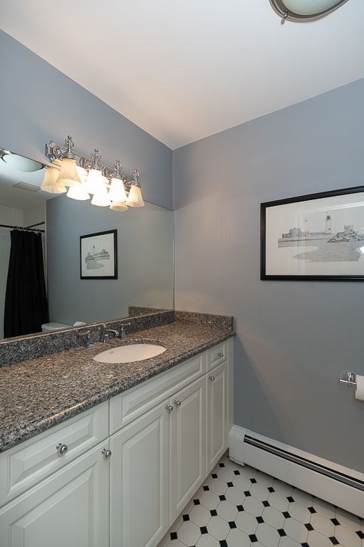 30 Autumn Lane Hamilton, MA 01982 - Photo 27 of 42 a bathroom with a sink and a mirror