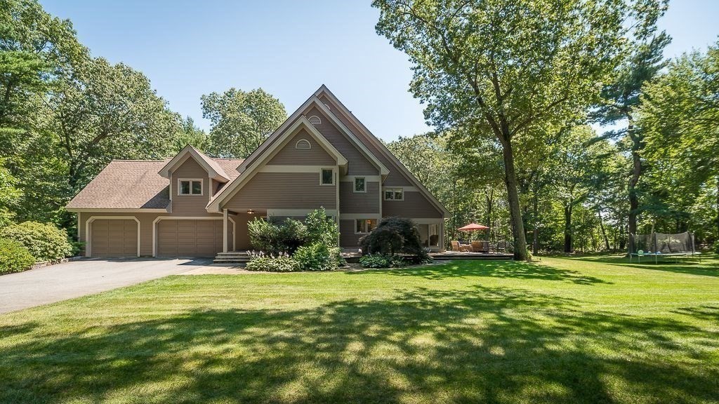 30 Autumn Lane Hamilton, MA 01982 - Photo 36 of 42 a front view of a house with a yard