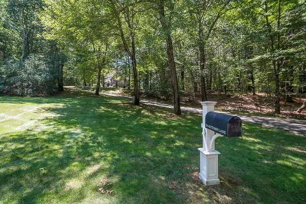 a fire hydrant in the middle of a field