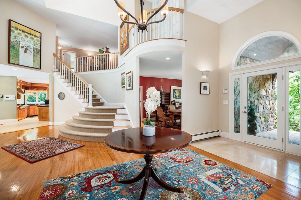 30 Autumn Lane Hamilton, MA 01982 - Photo 6 of 42 a living room with furniture and a table