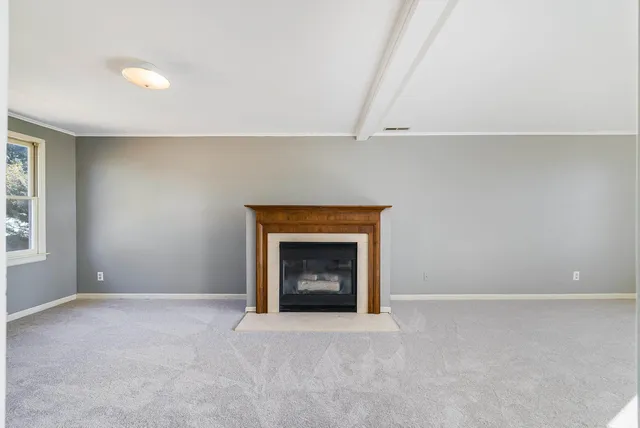 a view of a livingroom with a staircase