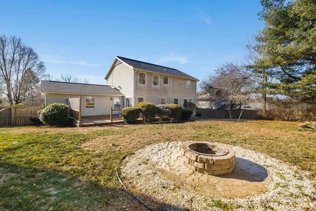 an aerial view of a house with lake view