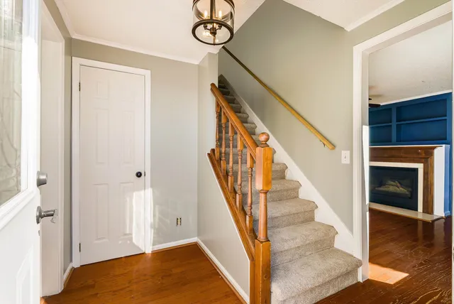 a view of a livingroom with furniture and a fireplace