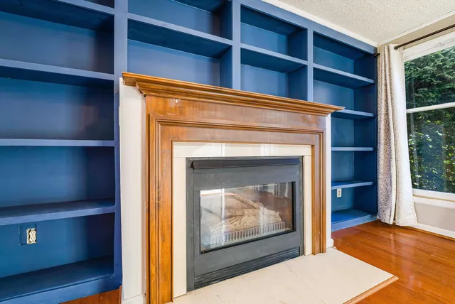 a kitchen with stainless steel appliances granite countertop a stove a refrigerator and a refrigerator