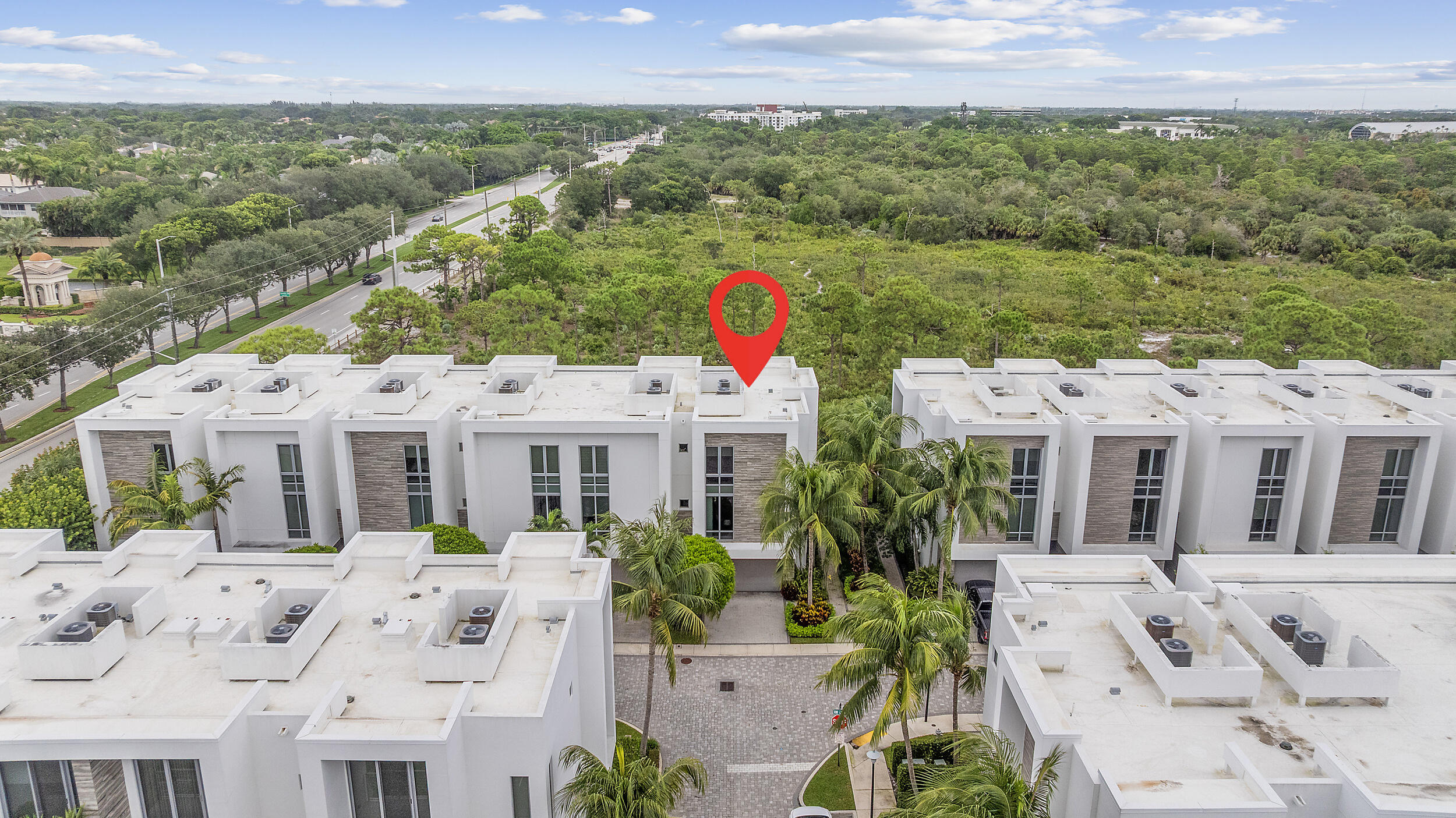 1811 Northwest 42nd Drive Boca Raton, FL 33431 - Photo 41 of 51 a front view of a house with a yard