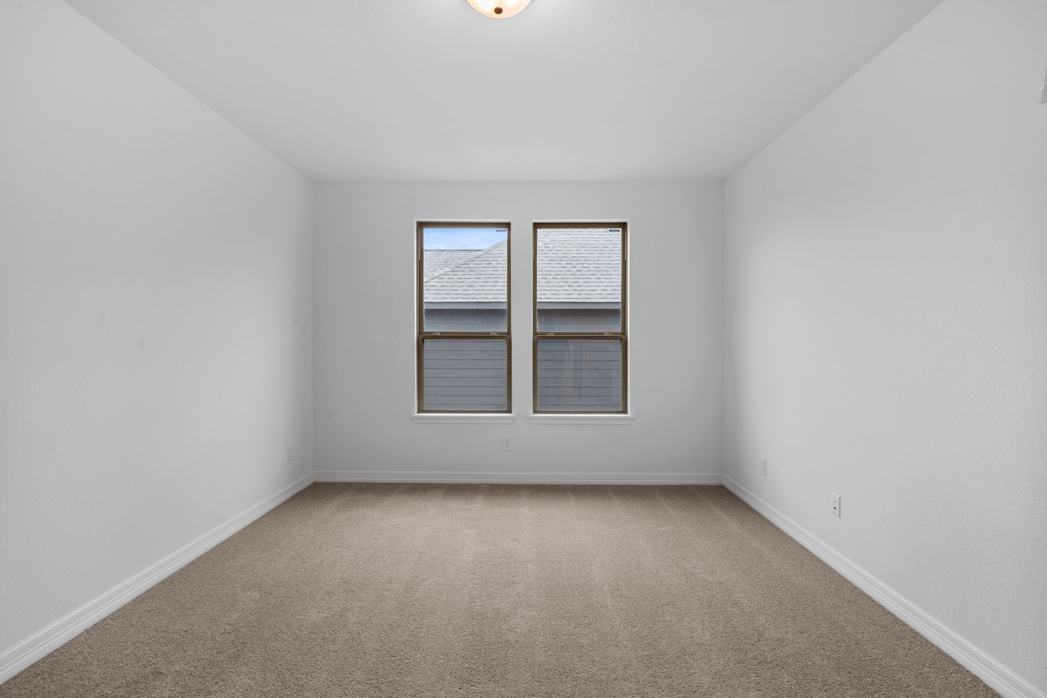 7727 Jade Crst Drive Angleton, TX 77515 - Photo 16 of 20 an empty room with a window