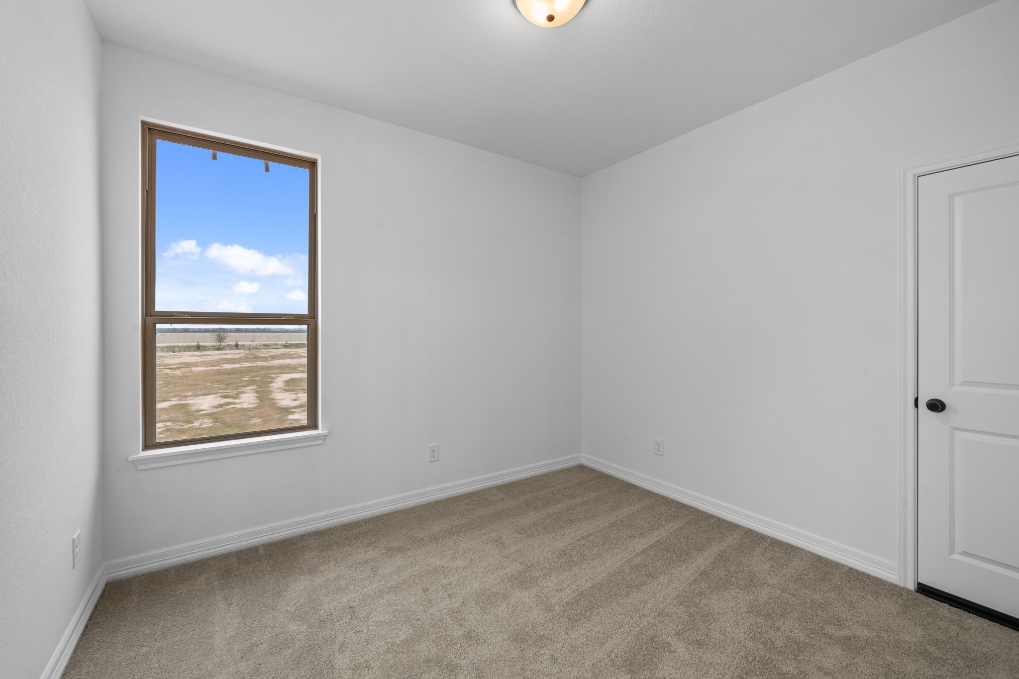 7727 Jade Crst Drive Angleton, TX 77515 - Photo 19 of 20 an empty room with a window