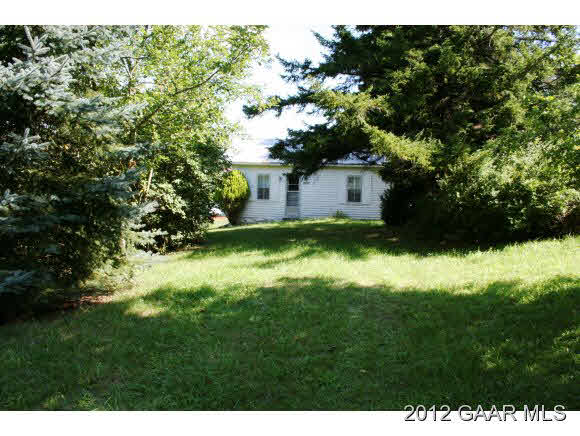 4966 Maple Sugar Road Blue Grass, VA 24413 - Photo 1 of 22 a view of a house with a yard