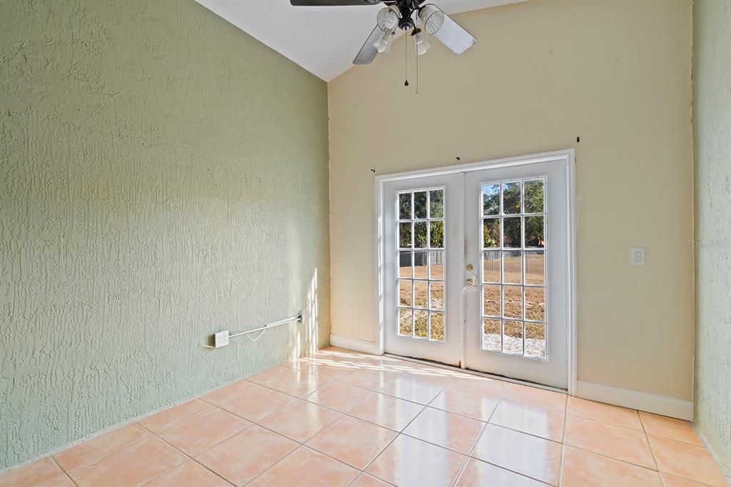 1533 Sunset View Circle Apopka, FL 32703 - Photo 9 of 23 a view of an empty room with a window