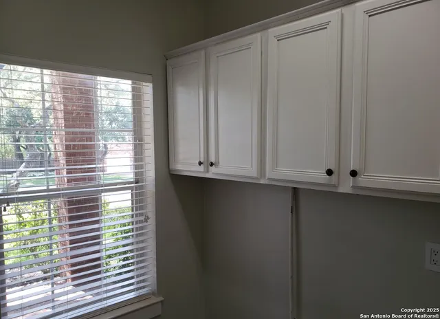 a view of window and cabinet