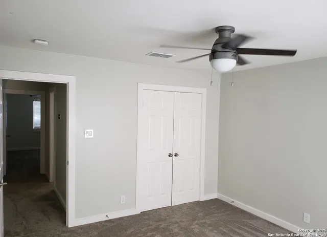 a view of a livingroom with a hallway