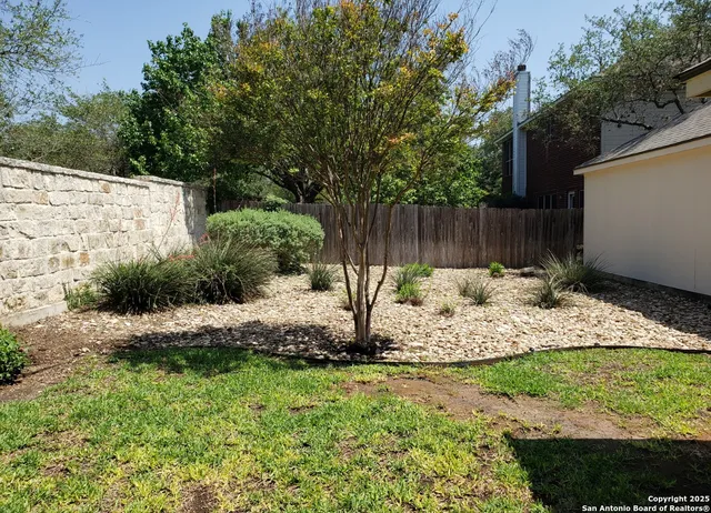 a view of a house with garden