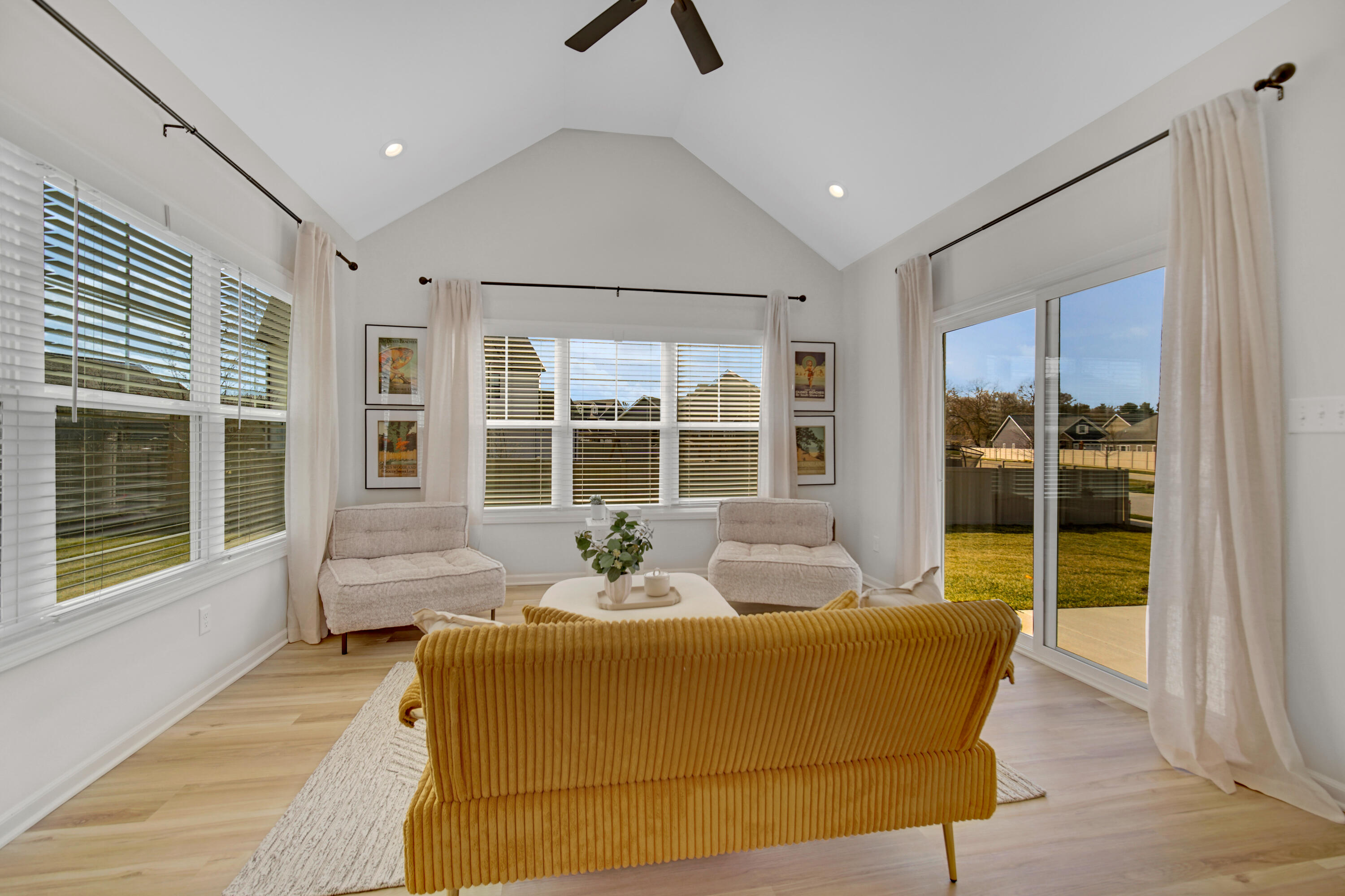 716 Verdano Terrace Crown Point, IN 46307 - Photo 12 of 26 a living room with furniture and large windows