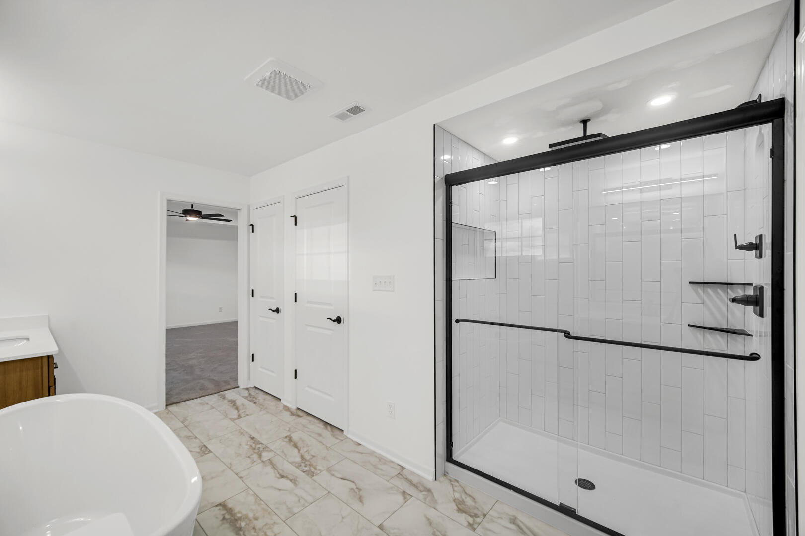 716 Verdano Terrace Crown Point, IN 46307 - Photo 17 of 26 a bathroom with a bathtub and a shower