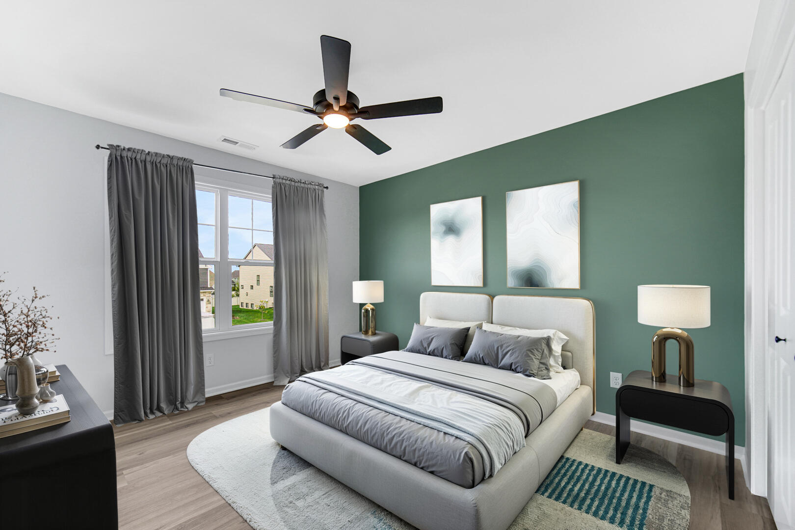 716 Verdano Terrace Crown Point, IN 46307 - Photo 18 of 26 a bedroom with a bed lamps and a large mirror