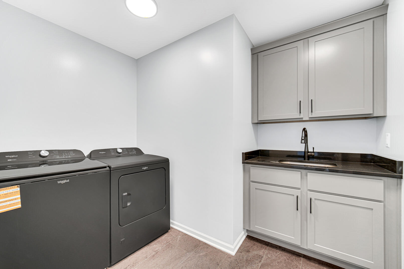 716 Verdano Terrace Crown Point, IN 46307 - Photo 23 of 26 a kitchen with granite countertop cabinets and sink