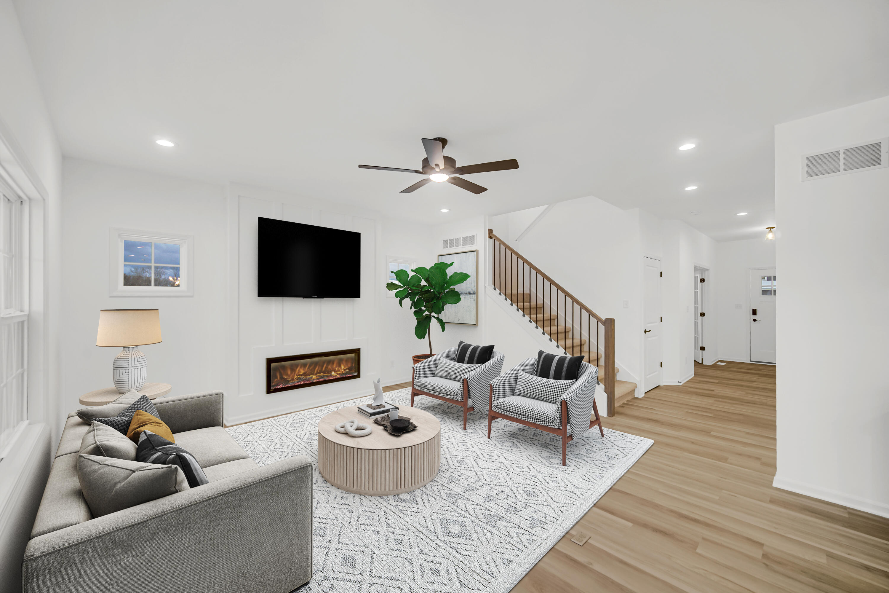 716 Verdano Terrace Crown Point, IN 46307 - Photo 3 of 26 a living room with furniture and a flat screen tv