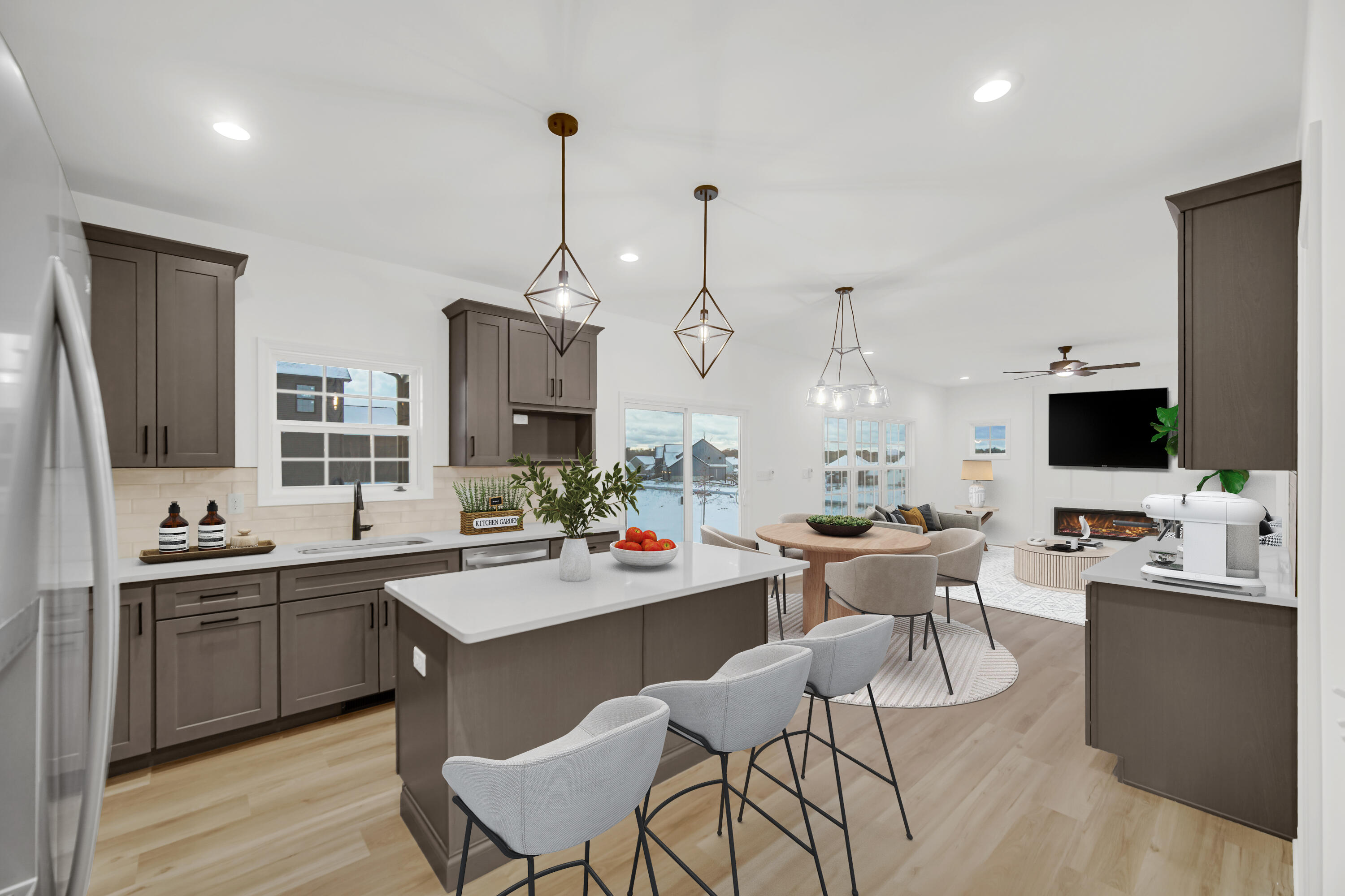 716 Verdano Terrace Crown Point, IN 46307 - Photo 8 of 26 a view of a dining room and livingroom with furniture wooden floor a chandelier