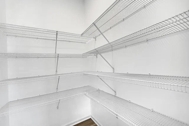 a view of a room with racks on the wall