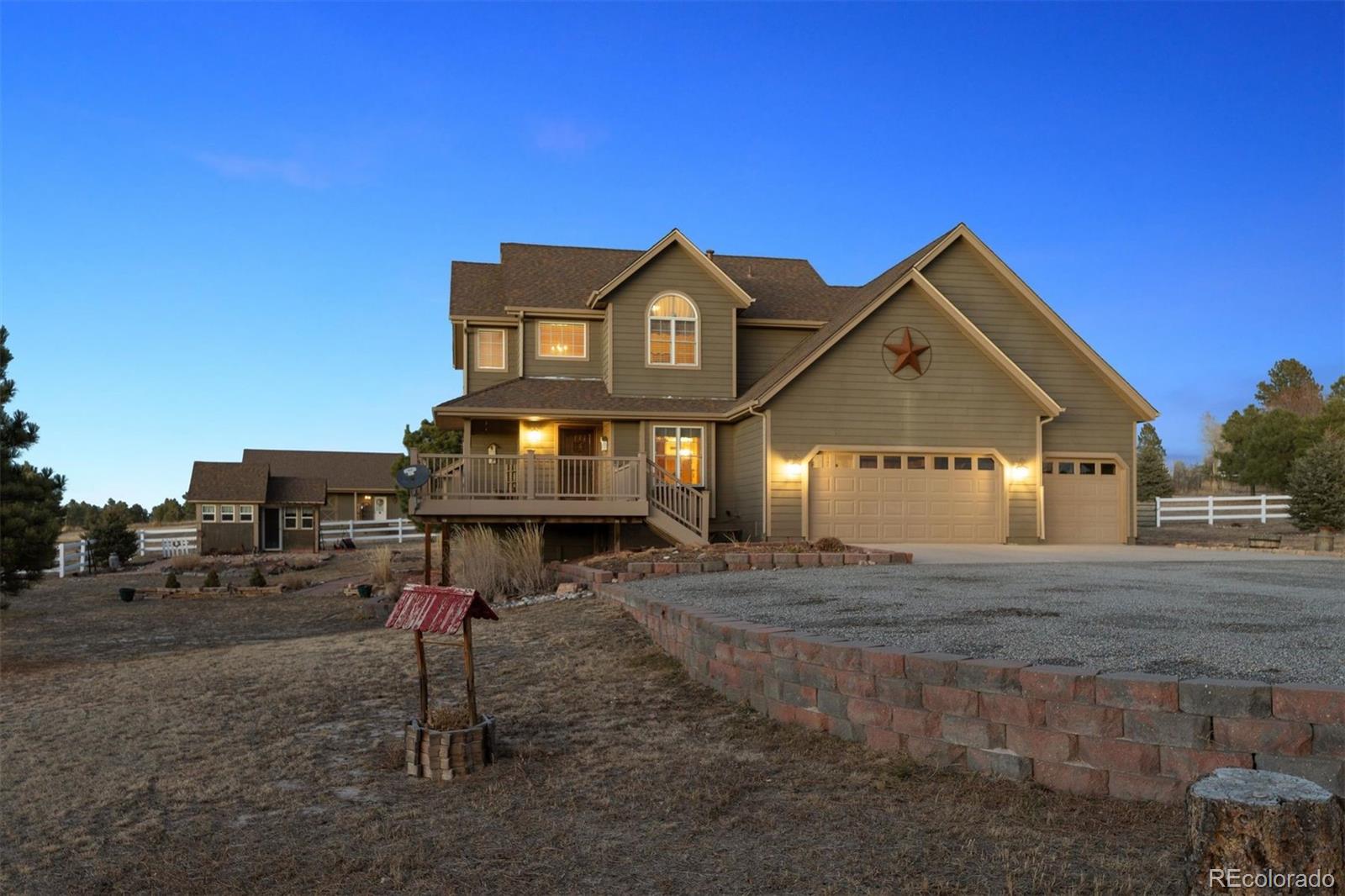 3779 Pasture Gate Circle Elizabeth, CO 80107 - Photo 1 of 49 a front view of a house with a yard