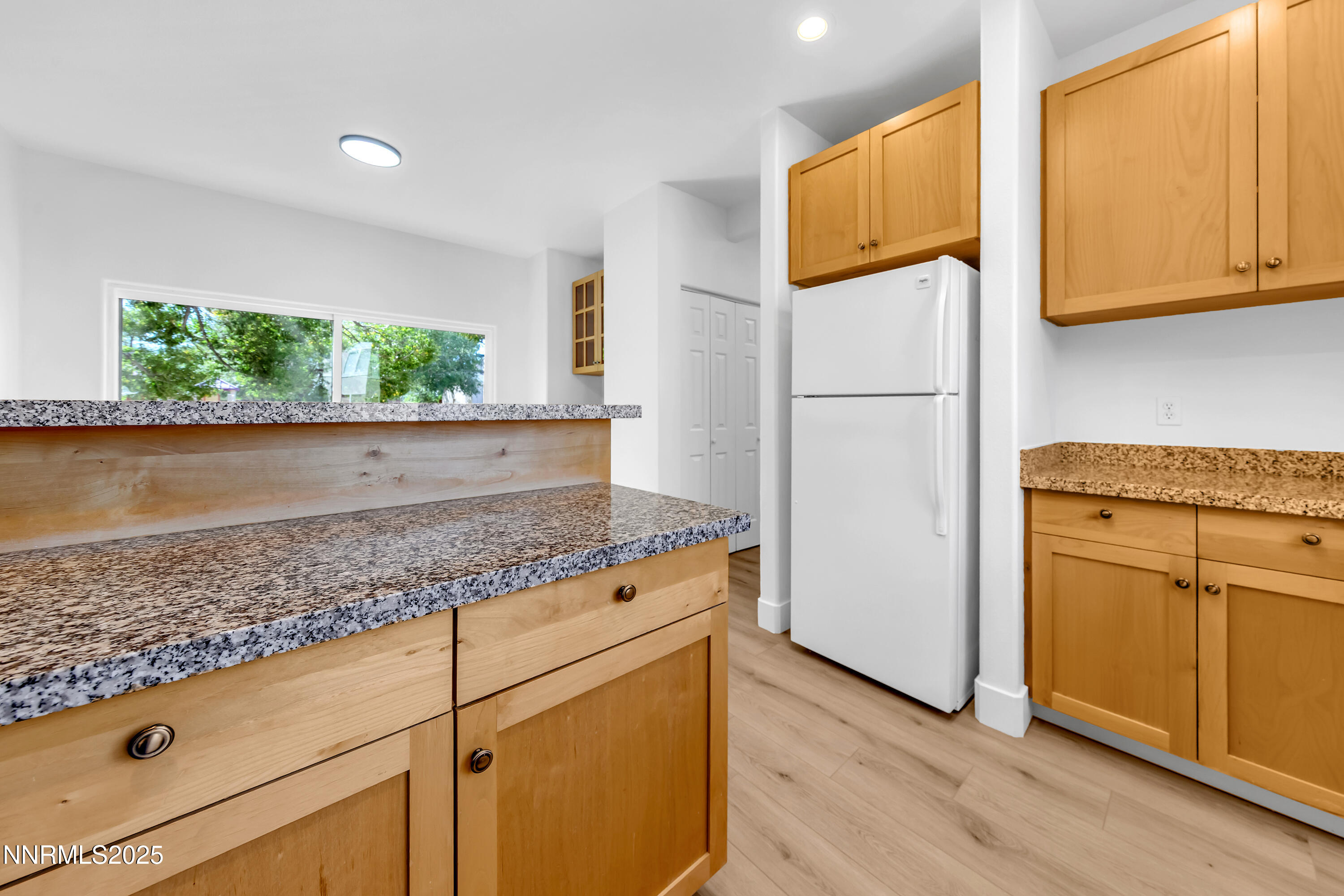 520 Warren Court Reno, NV 89509 - Photo 13 of 42 a kitchen with granite countertop cabinets stainless steel appliances and a counter space