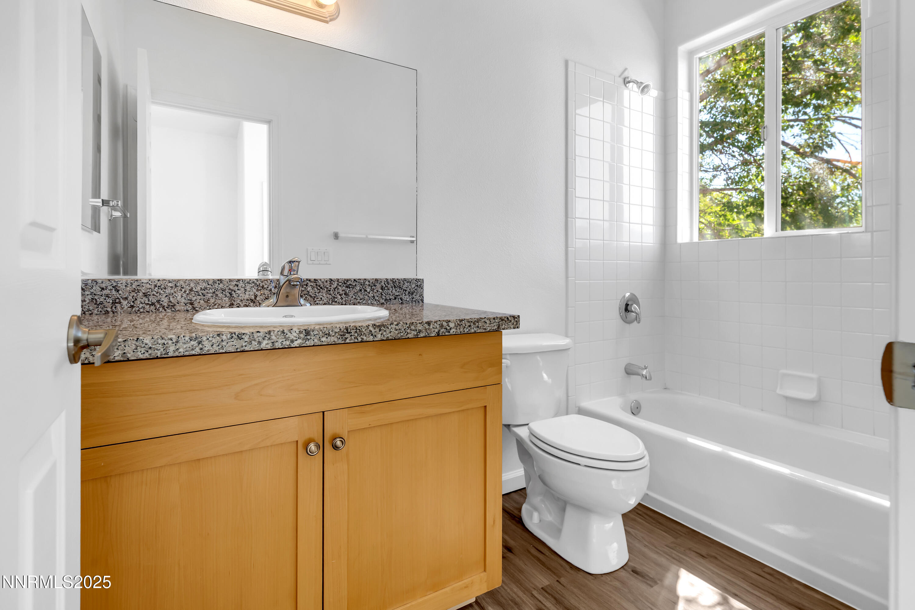 520 Warren Court Reno, NV 89509 - Photo 29 of 42 a bathroom with a granite countertop sink toilet and shower