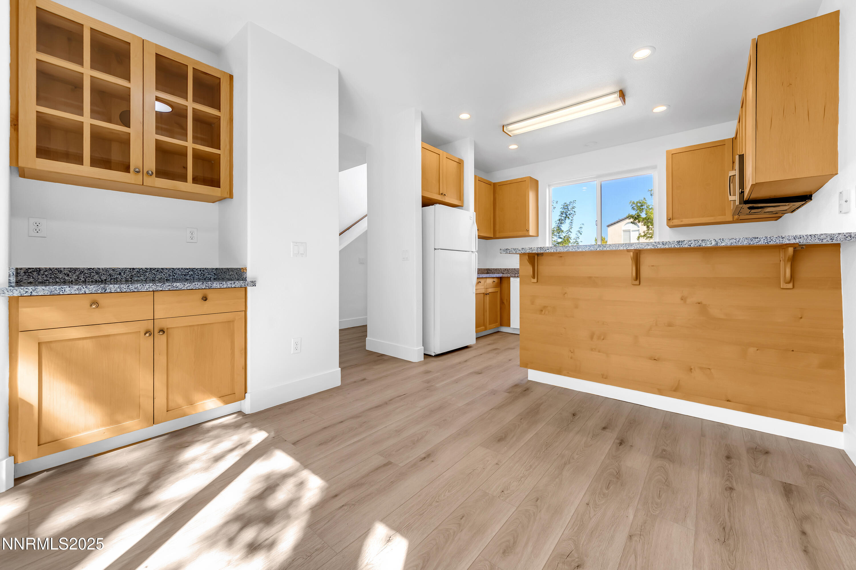 520 Warren Court Reno, NV 89509 - Photo 6 of 42 a view of a kitchen with wooden floor and a sink