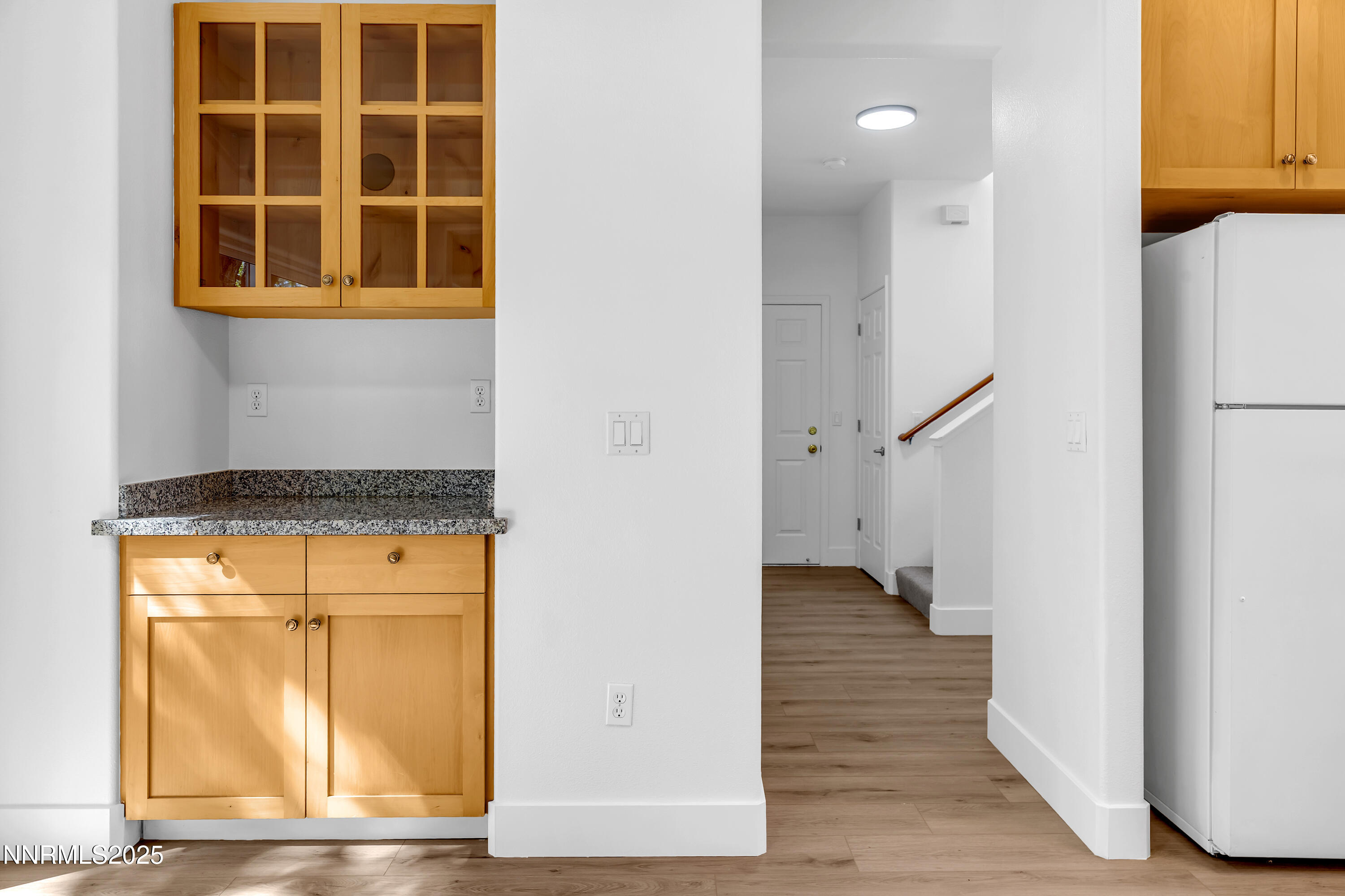 520 Warren Court Reno, NV 89509 - Photo 7 of 42 an entryway with wooden floor and cabinets